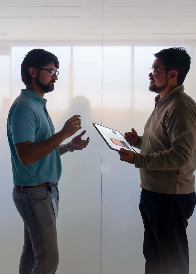 international-two-male-employees-ATC-office
